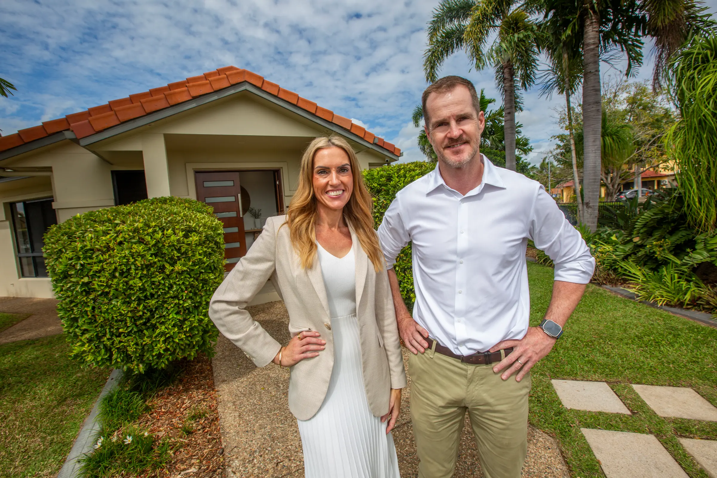 Steven and Leann McDonald outside a Smart Rentals managed home